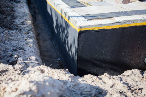 Professional Waterproofing technician working in Crossville, TN
